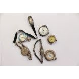 A collection of assorted watches, comprising a 1951 silver cocktail marcasite wristwatch,
