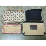 A collection of four clutch bags