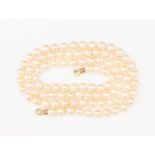 A single row cultured pearl necklace, pearl diameter approx 8 mm, with an 18ct gold claw fastening,