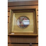 Porcelain plaque, probably Derby, decorated with floral bouquets, 21cm diameter, framed.