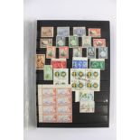 Shaubeck red stock book, containing world stamps,