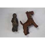 A small cold painted bronze figure of a Terrier Dog 50mm in height and figure of a Fisherman 55mm