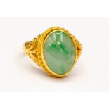 A jadeite and yellow metal dress ring, the oval cabochon jadeite approx 11mm x 14mm, ,