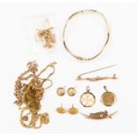 A collection of 9ct gold and yellow metal items items including chains, bracelets,