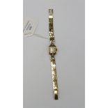 A ladies vintage crusader 9ct gold bracelet watch with diamond set lugs, square dial, 15 mm,