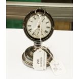 A silver open faced gents pocket watch on stand (2)