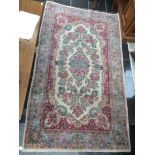 A 20th Century Agra hand knotted woollen rug,