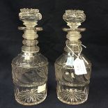 A pair of early Victorian cut glass decanters, with three ring necks,