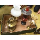 Four various oil lamps with funnels and shades (4)