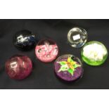 A collection of six Caithness glass paperweights including; Chantilly; a floral Fountain;