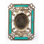 A Russian silver guilloche enamel frame, rectangular form with silver ribbon tied cut corners,