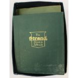 The Strand stamp album containing a large collection of various stamps, from around the world,