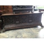 A hand carved oak coffer chest.