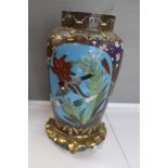A 19th Century Chinese Cloisonne vase (cover not available) sited on a gilt lotus flower,