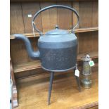 Early 20th Century miners lamp with large cast kettle on stand