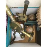 An antique brass bar mounted hand operated corkscrew,