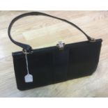 A vintage 1950's black lizard skin leather frame bag, shoulders strap, gold tone hard ware,