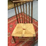 A Edwardian beech rush seated side chair,