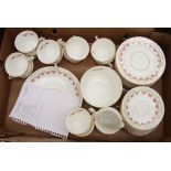 A Royal Albert Pink Garland tea set, comprising twelve cups, twelve saucers, twelve side plates,