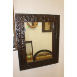 Copper Arts & Crafts wall mirror with a 1970's wall mirror