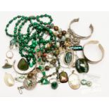A collection of costume jewellery comprising semi precious beads necklaces including malachite and