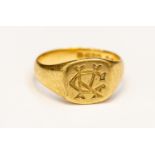 An 18ct gold signet ring, cushion shaped with G C K monogram, size T¼, total weight gross approx 8.