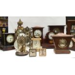 A collection of ten assorted mantle clocks, one wall clock,