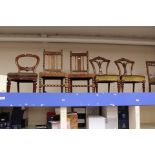A collection of five various chairs, comprising a pair of Victorian dining chairs,