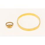 A gold bangle, diamond cut texture, Middle Eastern 21ct gold, internal diameter approx 65 mm,