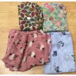 Four scarves, three by Joules, one is pink shay and sheep design, one is a floral design,