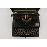 A vintage cased typewriter