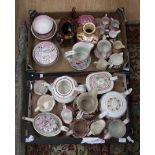 A collection of 19th century Lustre teapots,water jug,slop bowls,sugar bowls and a vase.