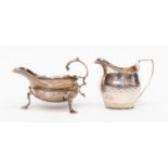 A George III silver sauce boat, ogee rim on three trefoil pad feet, London 1761,