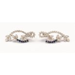 A pair of diamond and sapphire 18ct white gold solid drop earrings,