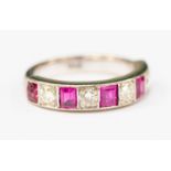 An 18ct white gold, diamond and rubies half eternity ring,
