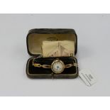 A ladies 9ct rose gold wristwatch, 2.