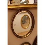 Regency style circular mirror, gilt framed mirror, oval oak framed bevelled mirror,