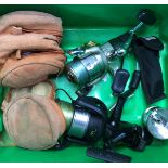 Angling interest: A box containing two fixed spool reels, spare fly fishing reel spools,