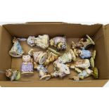 Fourteen Royal Albert Beatrix Potter figurines including Tom Kitten and Peter Rabbit