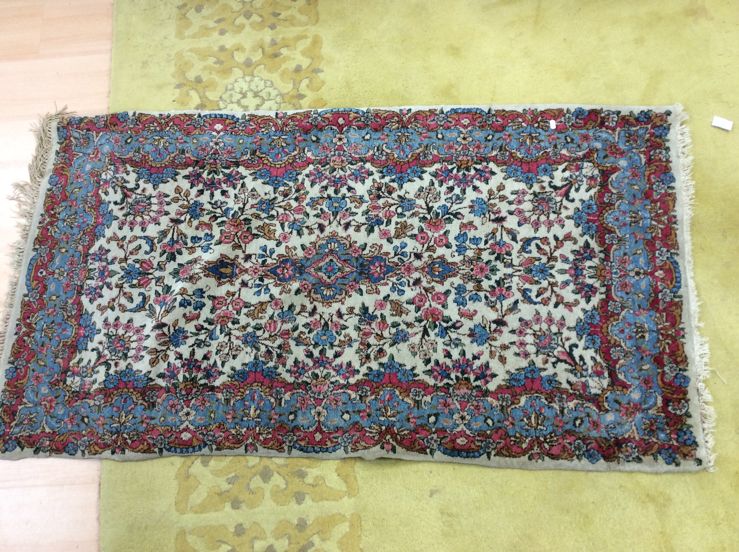 A 20th Century hand knotted woollen rug,