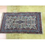 A 20th Century hand knotted woollen rug,