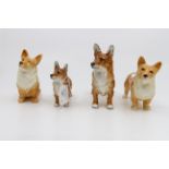 Four Corgi dogs: two Royal Doulton,