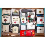 Tinplate: A collection of tinplate battery operated police cars to include: Ichiko, Daiya, Aoshin of
