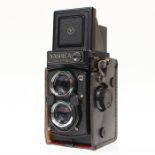 Yashica: A cased Yashica Mat-124G TLR camera, complete with filters and instruction manual.