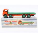 Dinky: A boxed Dinky Toys, 902 Foden Flat Truck, vehicle paint chipped, box having one split corner,
