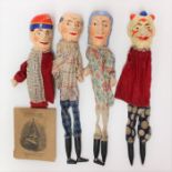 Punch and Judy: A collection of four wooden puppets, including a Punch and Judy puppet and two