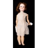 Armand Marseille: A bisque head Armand Marseille doll, marked 'Germany 390 A 6 M', with walking/