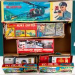 Tinplate: A boxed Japanese, battery operated, Nomura: Helicopter, boxed Horikawa 'Super News