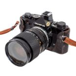 Olympus: An Olympus OM-1 camera body, black, complete with a Tamron 28-70mm, 1:3.5-4.5, Macro