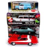 Diecast: A boxed Ghostbusters Ecto 1 Ambulance, 1:21 scale, boxed Kyosho 1:18 Mini Van Police, boxed